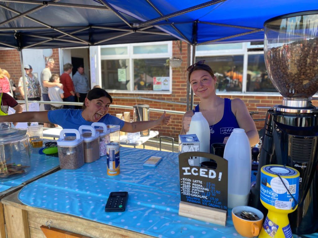 coffee can staff serving iced coffee